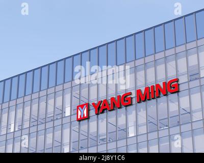 Keelung City, Taiwan. May 2, 2022. Editorial Use Only, 3D CGI. Yang Ming Marine Transport Corporation Signage Logo Top Glass Building. Workplace Shipp Stock Photo