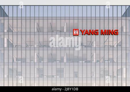 Keelung City, Taiwan. May 2, 2022. Editorial Use Only, 3D CGI. Yang Ming Marine Transport Corporation Signage Logo Top Glass Building. Workplace Shipp Stock Photo