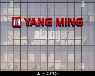 Keelung City, Taiwan. May 2, 2022. Editorial Use Only, 3D CGI. Yang Ming Marine Transport Corporation Signage Logo Top Glass Building. Workplace Shipp Stock Photo
