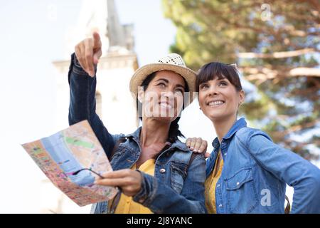 two women are sight seeing Stock Photo