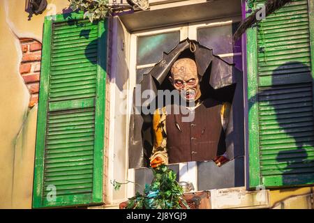 A horror character outside haunted attraction at Christmas funfair Hyde Park Winter Wonderland of London Stock Photo