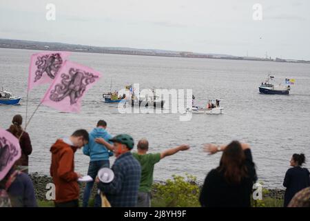 Fishing crews stage a protest in Teesport, Middlesbrough, near the mouth of the River Tees, demanding a new investigation into the mass deaths of crabs and lobsters in the area. They believe a 'dead zone' in North East inshore waters is killing marine life and 'decimating' their livelihoods. Picture date: Thursday May 19, 2022. Stock Photo
