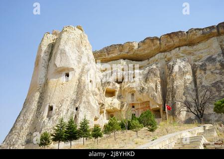 Cavusin Church, where you can see the oldest rock-cut church in the region, is the old settlement. Cappadocia, Nevsehir, Turkey Stock Photo