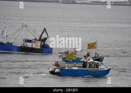 Fishing crews stage a protest in Teesport, Middlesbrough, near the mouth of the River Tees, demanding a new investigation into the mass deaths of crabs and lobsters in the area. They believe a 'dead zone' in North East inshore waters is killing marine life and 'decimating' their livelihoods. Picture date: Thursday May 19, 2022. Stock Photo