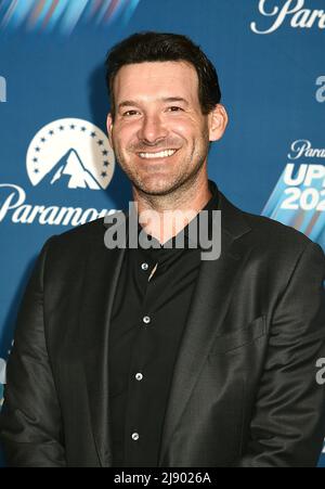 Tony Romo and wife Candice Crawford attend the Paramount Upfront 2022 Blue  Carpet on May 18