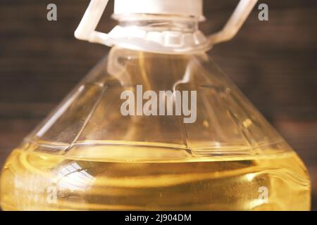 Palm oil in a plastic container close up , Stock Photo