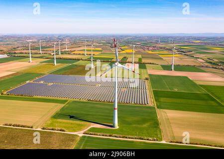 Renewable energies produced by wind turbines and solar parks on the fields in Rhineland-Palatinate Stock Photo
