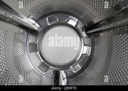 Drum of the washing machine from the inside, copy space Stock Photo