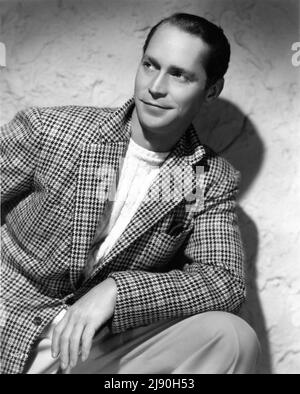 FRANCHOT TONE 1941 Portrait by RAY JONES publicity for Universal Pictures Stock Photo