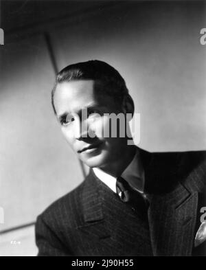 FRANCHOT TONE 1940 Portrait by RAY JONES publicity for Universal Pictures Stock Photo