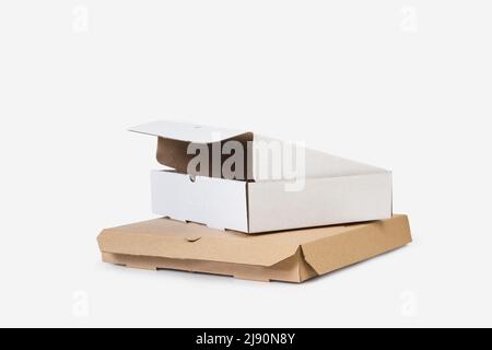White and brown cardboard pizza boxes on a white background Stock Photo