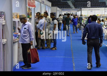 Kolkata, India. 19th May, 2022. People walk the 3rd Kolkata District Book Fair (14th to 20th May, 2022) which is organized by the Directorate of Library Services, Govt. of West Bengal in Kolkata, India, on May 19, 2022. Around 74 publishers appeared at this fair with their Bengali, English, Hindi and Urdu publications. (Photo by Pacific Press/Sipa USA) Credit: Sipa USA/Alamy Live News Stock Photo