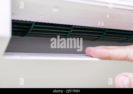 dirty ceiling air conditioner cooler closeup. Stock Photo