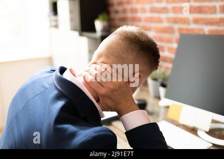 Back Pain Bad Posture Man Sitting In Office Stock Photo