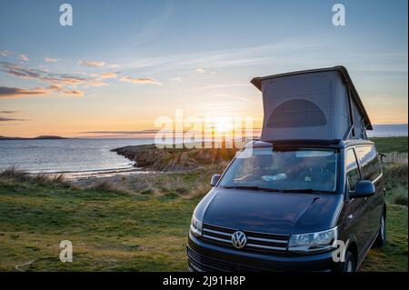 Ballyheirnan, Ireland- May 1, 2022; VW California Ocean Campervan at Ballyherinan Beach in County Donegal, Ireland at sunset Stock Photo