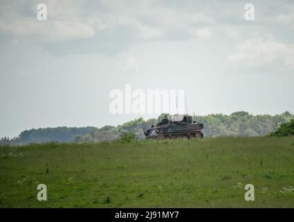 British army FV432 Bulldog armored personnel carrier on exercise on Salisbury Plain, UK Stock Photo