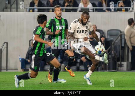 LAFC defender Sebastien Ibeagha (25) makes a pass against Austin FC midfielder Owen Wolff (33) during a MLS match, Wednesday, May 18, 2022, at the Ban Stock Photo