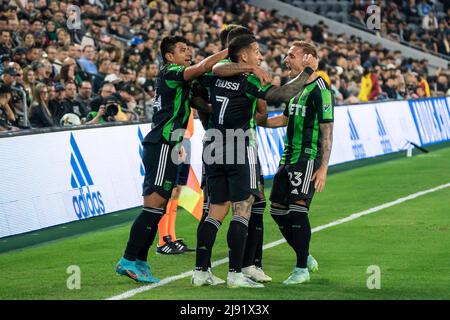 Austin FC forward Sebastián Driussi (7) celebrates with defender Žan Kolmanič (23) and teammates after a goal by Austin FC defender Ruben Gabrielsen ( Stock Photo