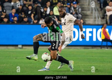 Austin FC forward Sebastián Driussi (7) is defended by LAFC defender Sebastien Ibeagha (25) during a MLS match, Wednesday, May 18, 2022, at the Banc o Stock Photo