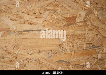Photo of construction material, close up wood chips pattern. Stock Photo