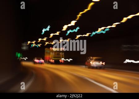 07.05.2021, Berlin, , Germany - Symbolic photo: blurred vision in a car tunnel. 00S210507D480CAROEX.JPG [MODEL RELEASE: NO, PROPERTY RELEASE: NO (c) c Stock Photo