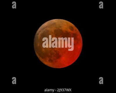 super blood moon during a total eclipse Stock Photo