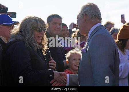 The Prince of Wales speaks to locals as he arrives to attend a Platinum Jubilee Ceremony at Ceremonial Circle, in Yellowknife, during their three-day trip to Canada to mark the Queen's Platinum Jubilee. Picture date: Wednesday May 18, 2022. Stock Photo