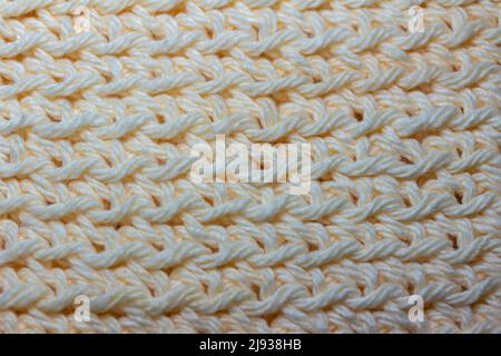 Close up abstract texture background of elegant crocheted fabric with white yarn Stock Photo