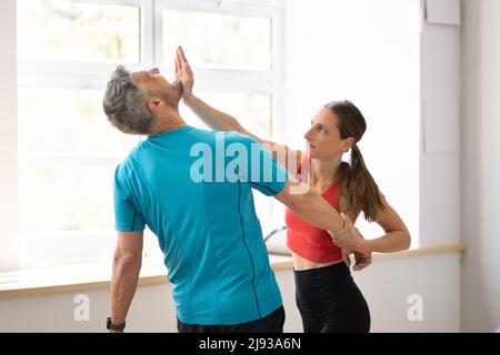 Fight Sparring Fitness Training In Gym. Female Power And Self Defense Stock Photo