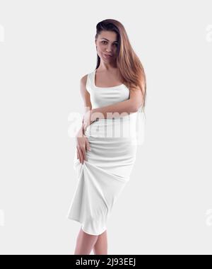 Mockup of a white tight dress, on a girl, beautifully straightening her clothes, isolated on background, front view, close-up. Template of a fashion s Stock Photo