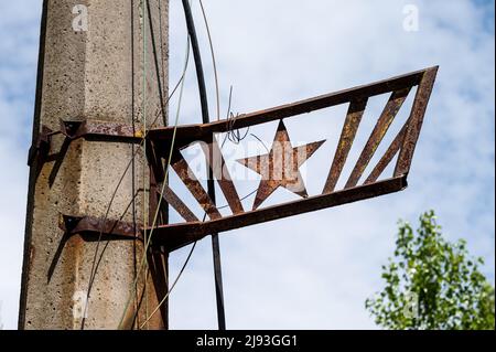 Prypiat, Ukraine. 19th May, 2022. A communist star on a utility pole. (Photo by Michael Brochstein/Sipa USA) Credit: Sipa USA/Alamy Live News Stock Photo