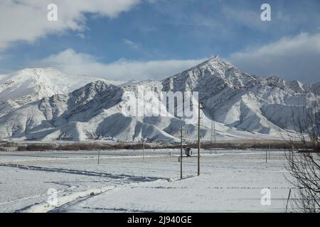 Snowcapped mountains in Tibet Stock Photo
