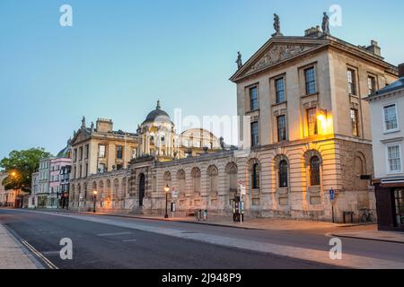 The Queen's College along the high street before sunrise in the spring. Oxford, Oxfordshire, England Stock Photo