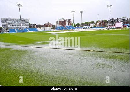 Hove UK 20th May 2022 -  The wet outfield on the first day of the cricket tour match between Sussex and New Zealand at the 1st Central County Ground Hove . : Credit Simon Dack / Alamy Live News Stock Photo