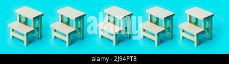 some wooden school desks on a blue background in a panoramic format to use as web banner or header Stock Photo