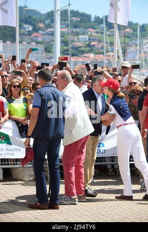 Sansenxo. Spain. 20220520,  King Juan Carlos of Spain, Princess Elena de Borbon attends third series of the Spanish 6 Metres Cup day 1 at Sanxenxo Royal Yacht Club on May 20, 2022 in Sansenxo, Spain   After nearly two years in exile in the United Arab Emirates following a string of financial scandals, Spain's former king makes his first trip back in Spain, on a brief visit that has sparked widespread criticism. Stock Photo