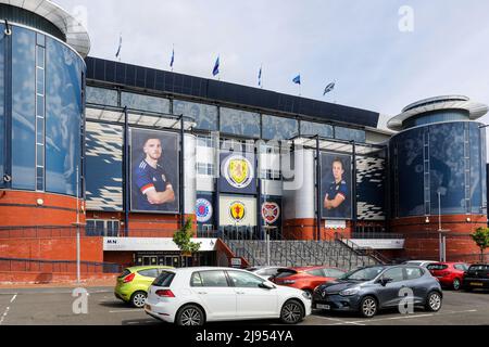 Glasgow, UK. 20th May, 2022. Hampden Park, the national stadium for Scottish football prepares for the 2022 Scottish Cup final on 21 May between Rangers FC and Heart of Midlothian by hanging club pendants at the front entrance. The last time Rangers won the Scottish Cup was in 2009 and Hearts last won it in 2012. The two team last met at Ibrox on 14 May 2022 when Rangers won 3 - 1. Credit: Findlay/Alamy Live News Stock Photo