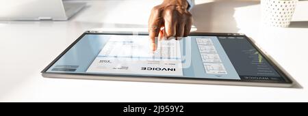 Digital Tax E Invoice Online Software On Tablet Screen Stock Photo