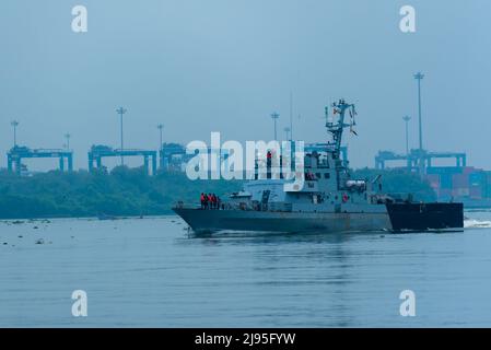 INS Kalpeni, a Car Nicobar class fast attack craft of the Indian Navy moving out from Kochi harbour. Stock Photo