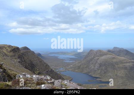 Ben Mor Coigach, an fab ridge near Ullapool, hikers, walkers, views of Summer Isles and Suilven mountain, Stac Poilaidh and Cul Mor views Sandstone Stock Photo