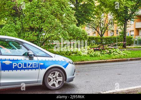 Berlin, Germany - June 12, 2019: Damage after a heavy storm in Berlin, Germany. Parts of the road are blocked because branches are blocking the road. Stock Photo