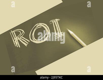 ROI text for Return on Investment yellow pencil on black. Business performance evaluation concept. Stock Photo
