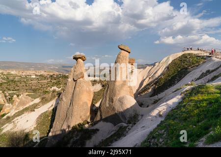 Three Graces (Three Beautifuls) rock hills in Devrent valley in Cappadocia, Nevsehir, Turkey Stock Photo