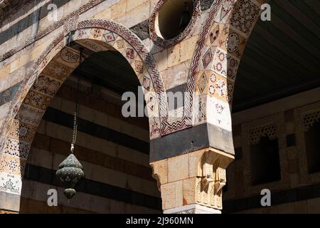Damascus, Syria -May, 2022: Oriental architecture details and decoration in Al Azem Palace of Damascus