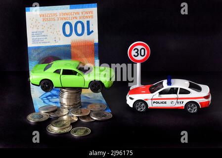 car accident with swiss money coins Stock Photo