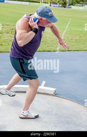 Fort Ft. Lauderdale Florida,Ansin Sports Complex Track & Field National Senior Games,male man competitor competing throwing shot put Stock Photo