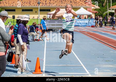 Fort Ft. Lauderdale Florida,Ansin Sports Complex Track & Field National Senior Games,man male long jump competition competitor jumping Stock Photo