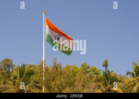 The National Flag of India is a horizontal rectangular tricolour of deep saffron, white and green; with the Ashoka Chakra, a 24-spoke wheel Stock Photo