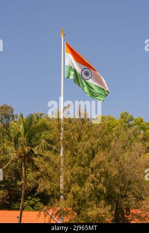 The National Flag of India is a horizontal rectangular tricolour of deep saffron, white and green; with the Ashoka Chakra, a 24-spoke wheel Stock Photo