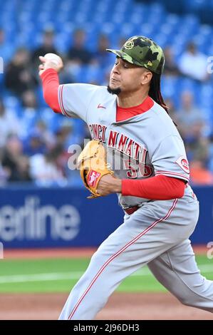 Toronto, Canada. 20th May, 2022. Toronto Blue Jays' George Springer hits an  RBI single, scoring Bradley Zimmer, not shown, in the fifth inning of an  Interleague League baseball game against the Cincinnati